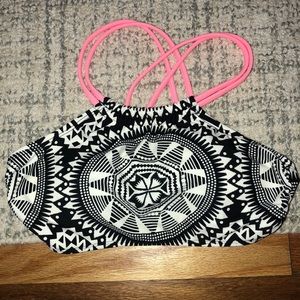 black, white, and coral bikini top